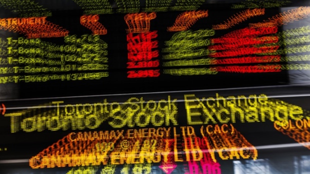 A sign board displaying Toronto Stock Exchange (TSX) stock information is seen in Toronto. 