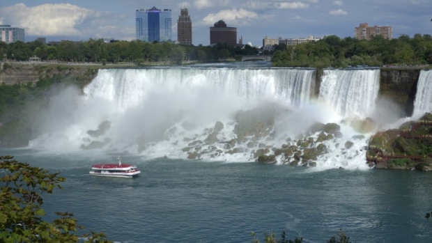The "Maid of the Mist" boat ventures at the bottom of the American Niagara Falls.
