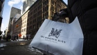 A shopping bag in front of the Hudson's Bay Company flagship department store in Toronto.
