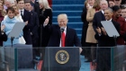 Donald Trump gives a thumbs after being sworn in as the 45th president of the United States