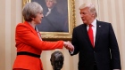 President Donald Trump shakes hands with British Prime Minister Theresa May in the Oval Office