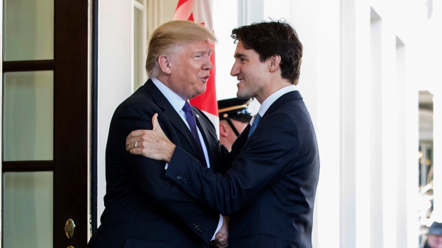 Justin Trudeau and Donald Trump talk at the White House on Feb. 13