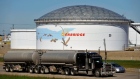 A storage tank looms over a freeway at the Enbridge Edmonton terminal in Edmonton August 4, 2012.