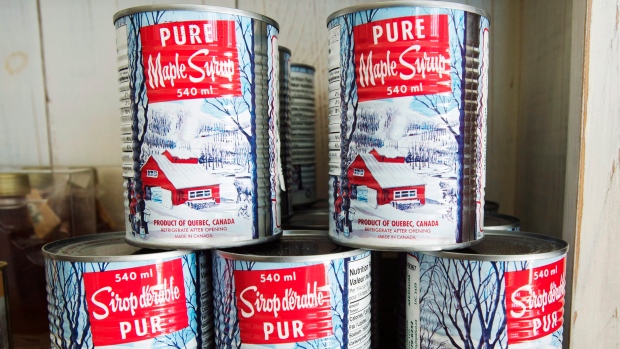 Maple syrup cans are seen at a sugar shack Friday, February 10, 2017 in Oka, Quebec. Quebec.