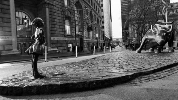 A new statue placed in front of the Wall Street bull for International Women's Day