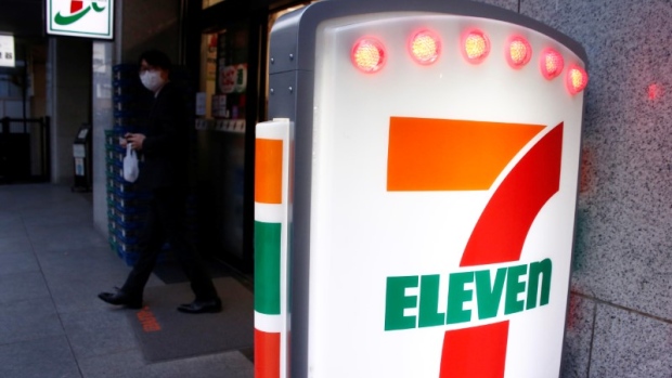 A man walks out of Seven & i Holdings Co's Seven Eleven store in Tokyo. 