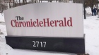 A sign for the Halifax Chronicle Herald