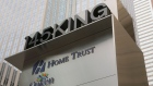 A sign shows the logos of Home Capital Group's subsidiaries Home Trust and Oaken Financial.