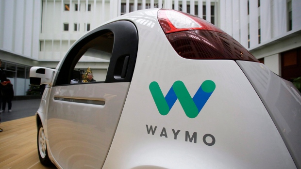The Waymo driverless car is displayed during a Google event, in San Francisco on Tuesday, Dec. 13