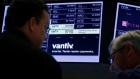 Traders wait for news at the post where U.S. credit card technology firm Vantiv Inc is traded