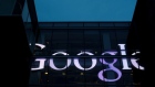 The sign marking the Google offices is lit up in Cambridge, Massachusetts