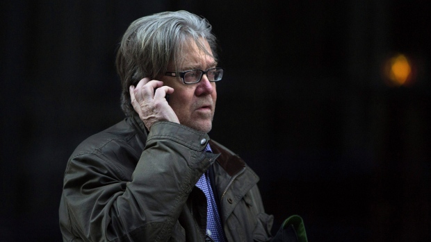 Steve Bannon makes a call outside Trump Tower on Friday, Dec. 9, 2016, in New York.