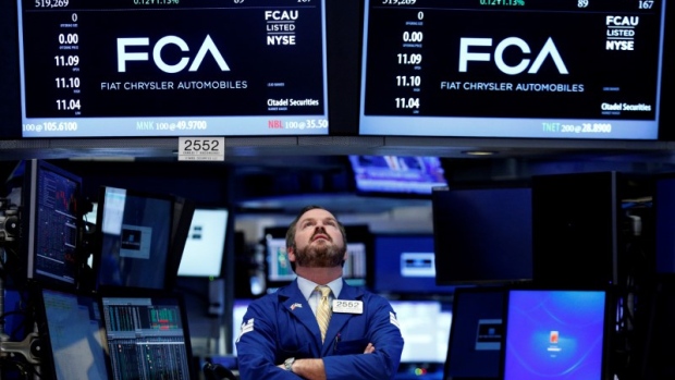A specialist trader works at the post where Fiat Chrysler Automobiles 