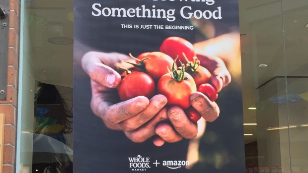 Whole Foods signage promoting Amazon partnership