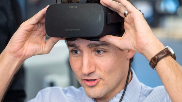 Prime Minister Justin Trudeau puts on a virtual reality headset