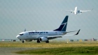A West Jet Boeing 737-700 aircraft\departs Vancouver International Airport in Richmond