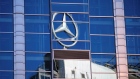 A Mercedes-Benz sign reflected on a building in Warsaw, Poland, July 6, 2017