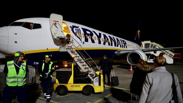 Passengers board a Ryanair flight in Gdansk, Poland September 27, 2017