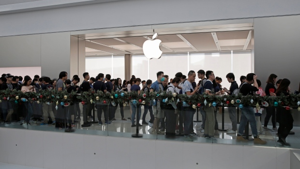 Customers line up to buy the new iPhone X