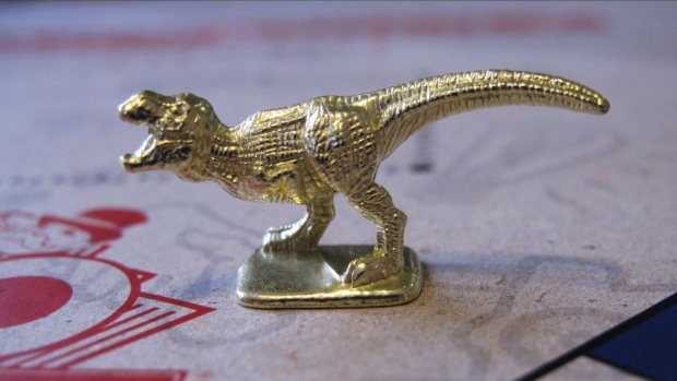 A T-Rex Monopoly piece.