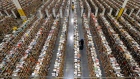 an Amazon.com employee stocks products at a Fulfilment Center in Phoenix retail
