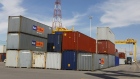 A truck is loaded with a container at the Port of Montreal, September 27, 2010. 