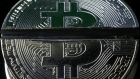 Sawed Bitcoin tokens representing the virtual currency are seen in this illustration picture