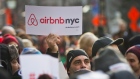 Supporters of Airbnb hold a rally outside City Hall in New York, Jan. 20, 2015