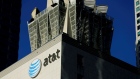 An AT&T logo and communication equipment is shown on a building in downtown Los Angeles