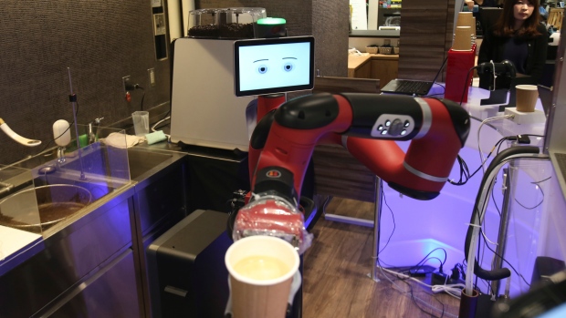 Robot barista named "Sawyer" makes a coffee at Henn-na Cafe