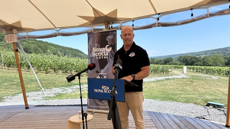 Andrew Tanner speaks at event