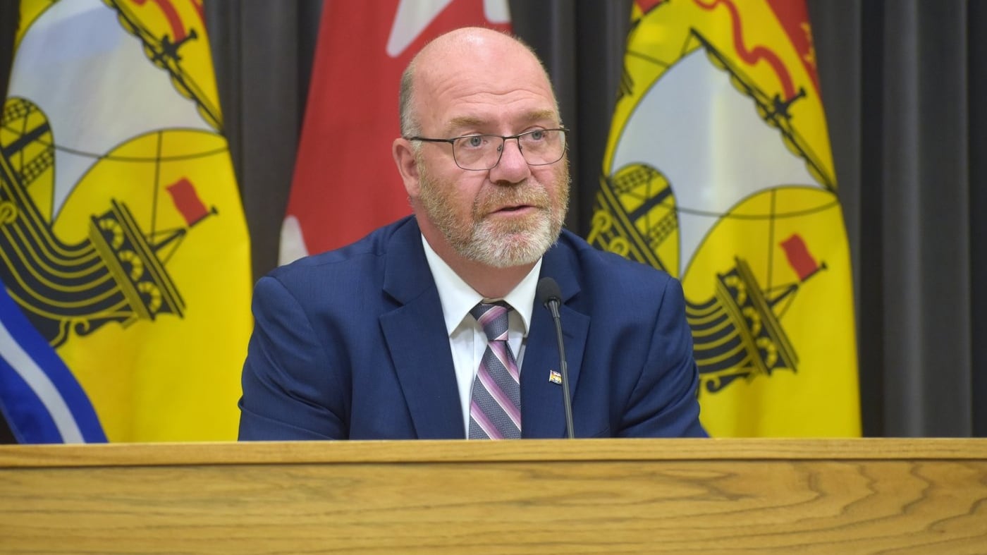 New Brunswick Finance Minister René Legacy addresses reporters as he unveils a fiscal update, in Fredericton, on Thursday, Aug. 27, 2026. THE CANADIAN PRESS/Eli Ridder