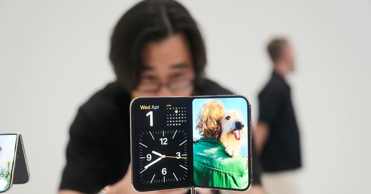 Apple’s foldable iPhone hits stores with $3,000 price tag and scarce ...