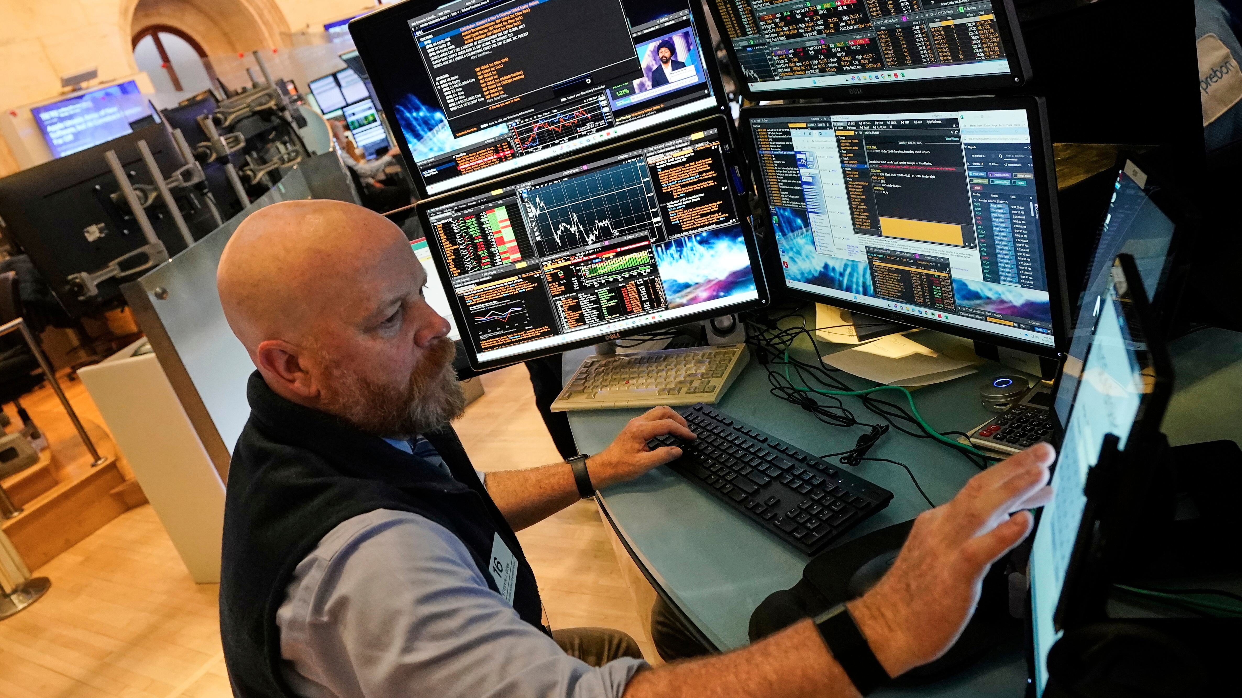 Trader Steven Gohl works on the floor of the New York Stock Exchange, Tuesday, June 10, 2025. (AP Photo/Richard Drew)