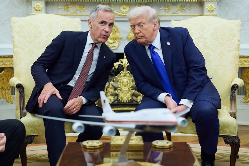 President Donald Trump meets with Canadian Prime Minister Mark Carney in the Oval Office of the White House, Tuesday, Oct. 7, 2025, in Washington. (AP Photo/Evan Vucci)