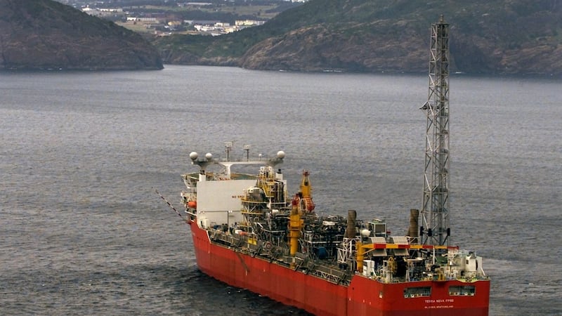 One oilsands major sells of N.L. offshore assets, another bulks up Alberta holdings