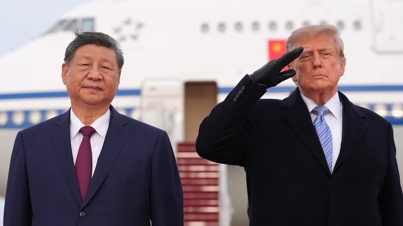 China’s Xi arrives in Washington, kicking off his state visit with rare planeside welcome from Trump