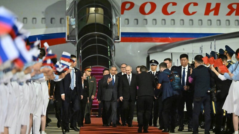 Putin visits China to reaffirm Russia ties as Xi also seeks stable U.S. relations after Trump summit