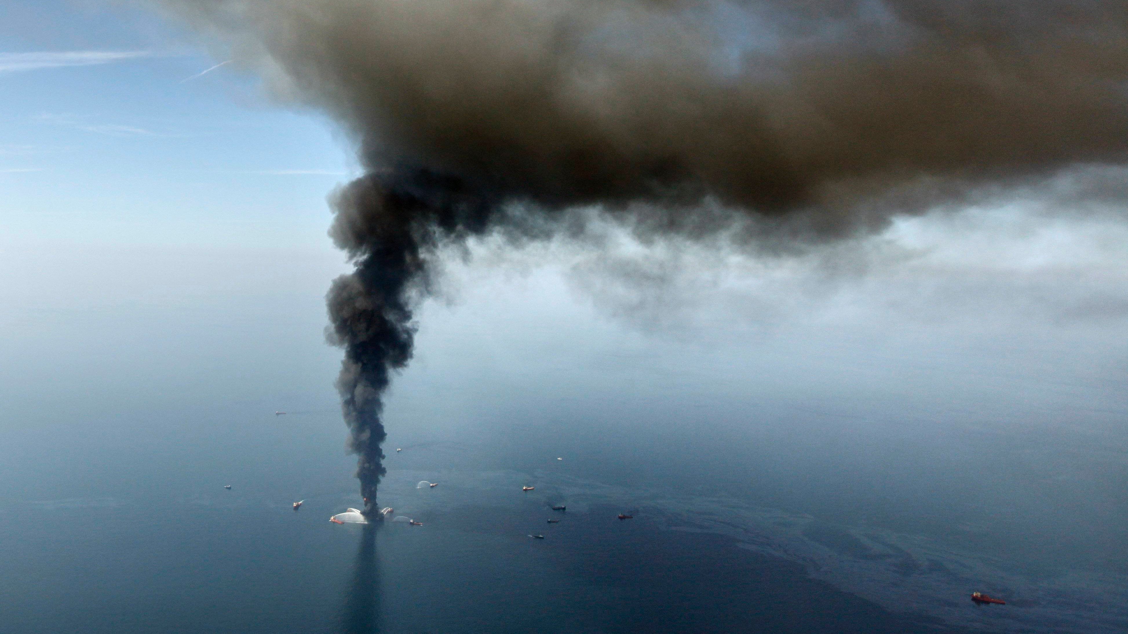 The Deepwater Horizon oil rig burns in the Gulf of Mexico on April 21, 2010. (Gerald Herbert / AP Photo)