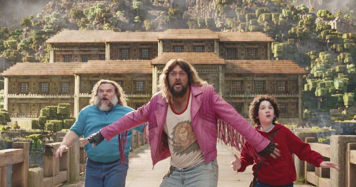 This image released by Warner Bros. Pictures shows, from left, Jack Black, Jason Momoa and Sebastian Hansen in a scene from "A Minecraft Movie." (Warner Bros. Pictures via AP)