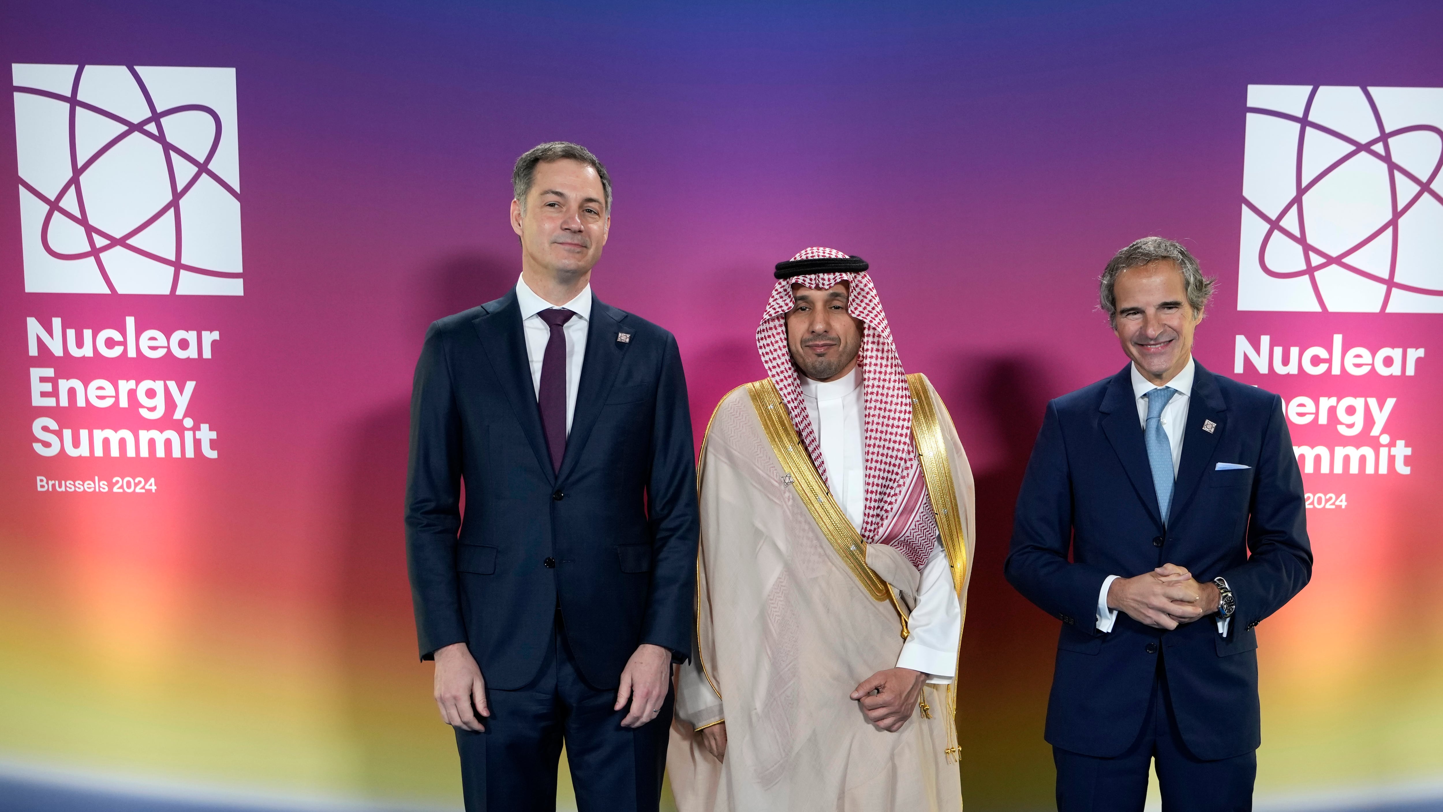 Belgium's then-prime minister Alexander De Croo, left, and IAEA official Rafael Mariano Grossi, right, welcome Saudi Arabia's CEO of King Abdullah during a nuclear energy summit in Brussels on March 21, 2024. (Virginia Mayo / AP Photo)