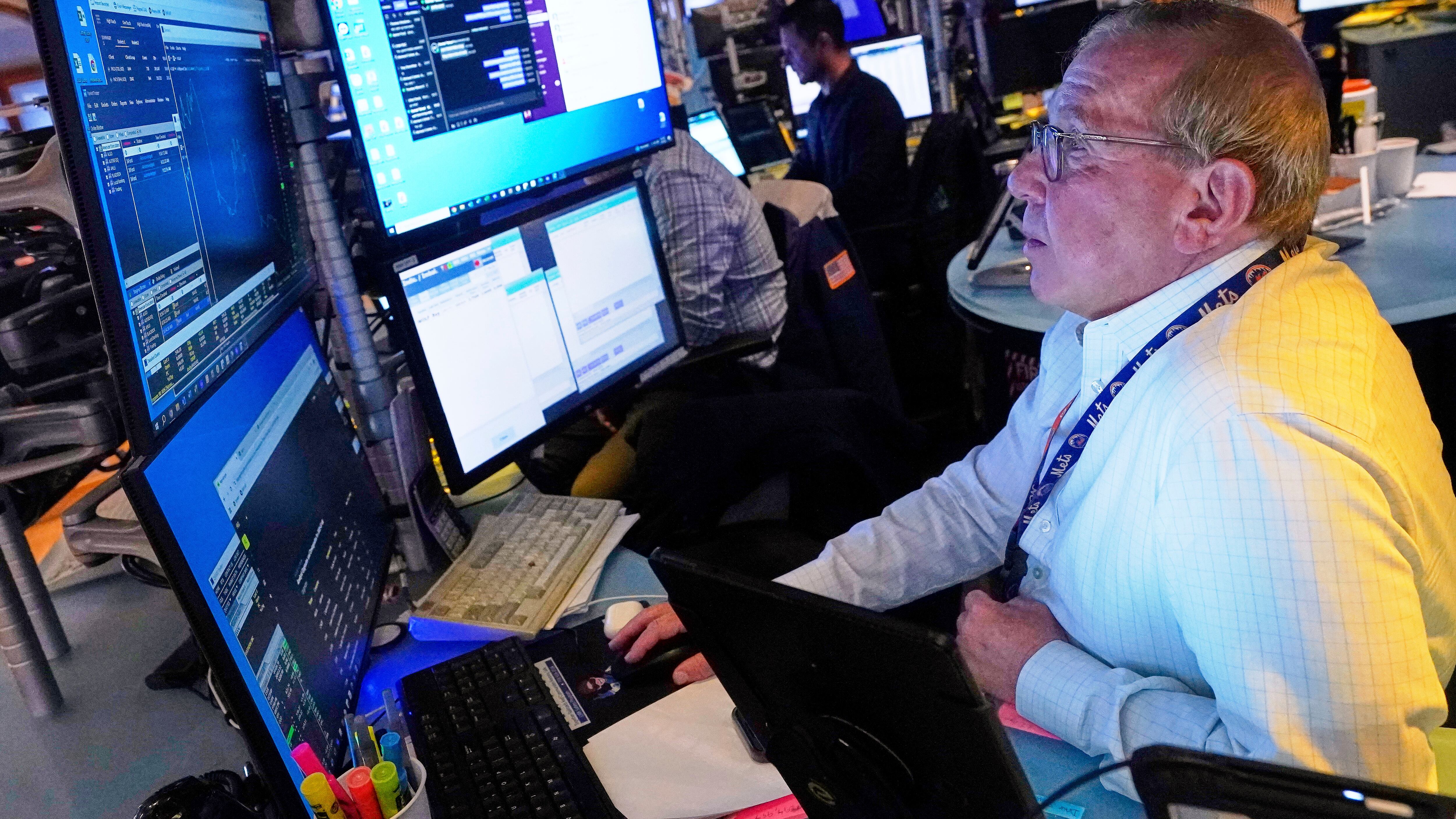 Trader Richard Cohen works on the floor of the New York Stock Exchange, Tuesday, July 8, 2025. (AP Photo/Richard Drew)