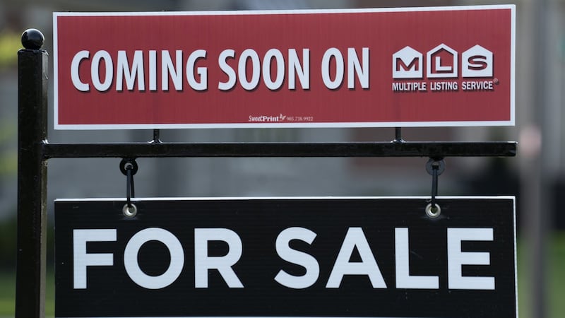 May home sales down 5.1% from year earlier, but CREA says momentum building
