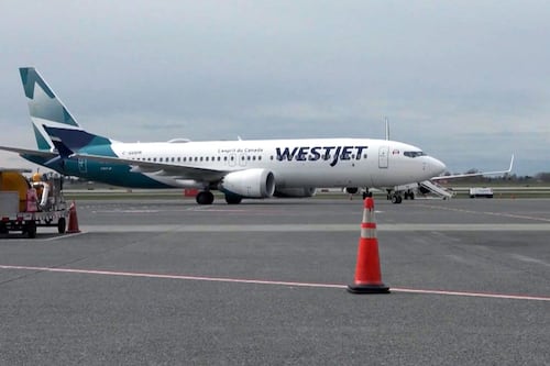 How should travellers prepare for a potential WestJet flight attendant strike?