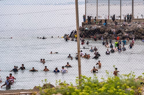 Migrants arrive in Ceuta as thousands cross into Spain