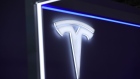 A logo on the Tesla Inc. stand on the opening day of the Munich Motor Show (IAA) in Munich, Germany, on Tuesday, Sept. 5, 2023. Europe's automakers are showing off their latest battery-powered vehicles at the IAA Mobility car show this week as they try to challenge Tesla Inc. and fend off growing competition from China. Photographer: Krisztian Bocsi/Bloomberg