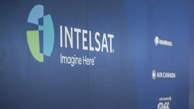 Signage of Intelsat at the company's booth at the Aviation Festival Asia 2023 in Singapore, on Tuesday, Feb. 28, 2023. The event runs through March 1.