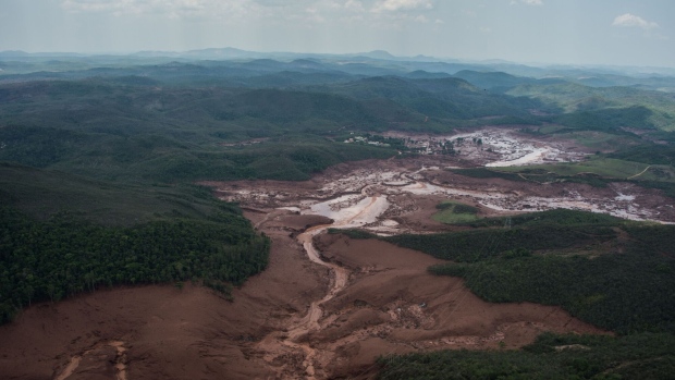 Damage following a dam burst in Bento Rodrigues near Minas Gerais, Brazil in Nov. 2015. Photographer: Christophe Simon/AFP/Getty Images