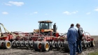 <p>An AGCO Corp. Challenger tractor pulls an air seeder.</p>