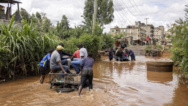Residents cross floodwater in the Githurai district of Nairobi.